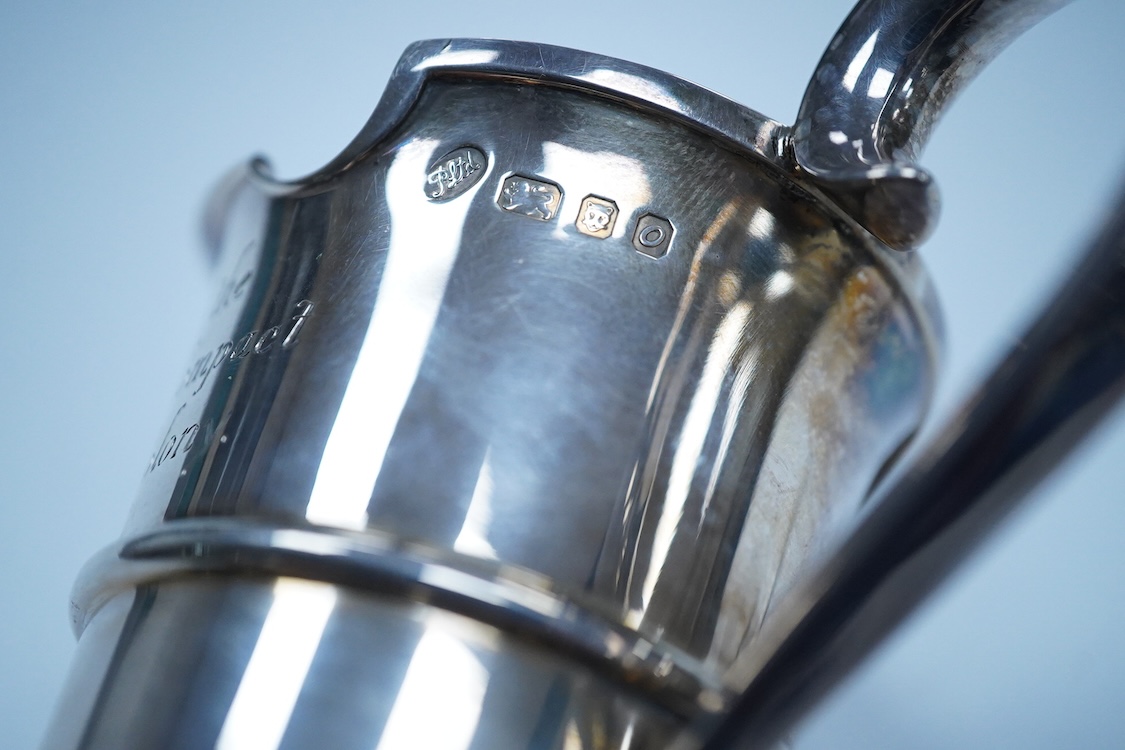 An Elizabeth II silver limited edition 'Mayflower' commemorative jug, maker P. Ltd, London. 1969, with engraved inscription and certificate of authenticity, no. 188/2000, height 14cm, 7.7oz.